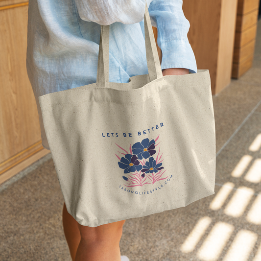Canvas_Tote_-_Lets_Be_Better_CottonTote_L_WomanDigging_Mockup.png