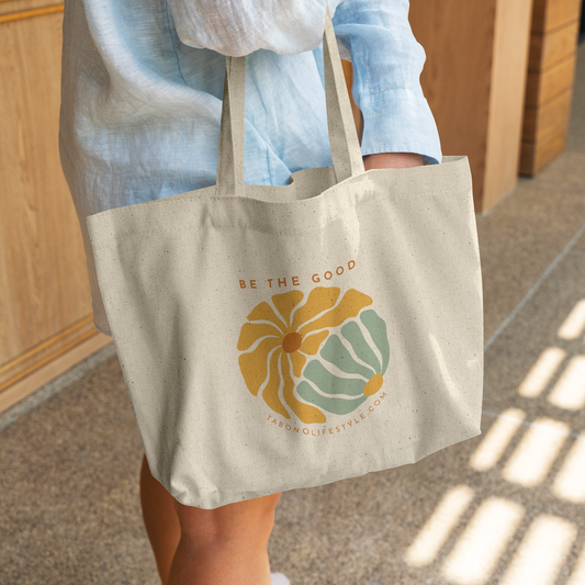 Canvas_Tote_-_be_the_good_CottonTote_L_WomanDigging_Mockup.png