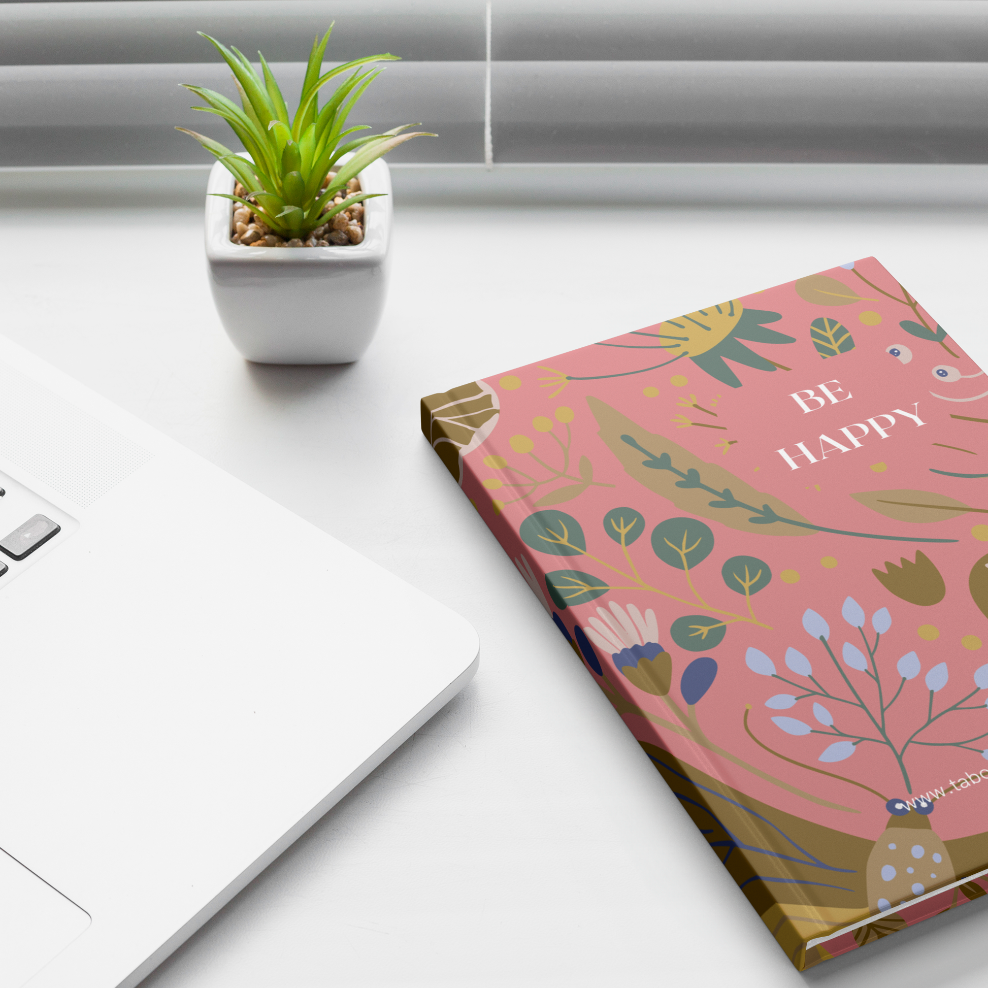 Hardcover_Journal_-_Be_Happy_-_Pink_Lifestyle_1_Mockup.png