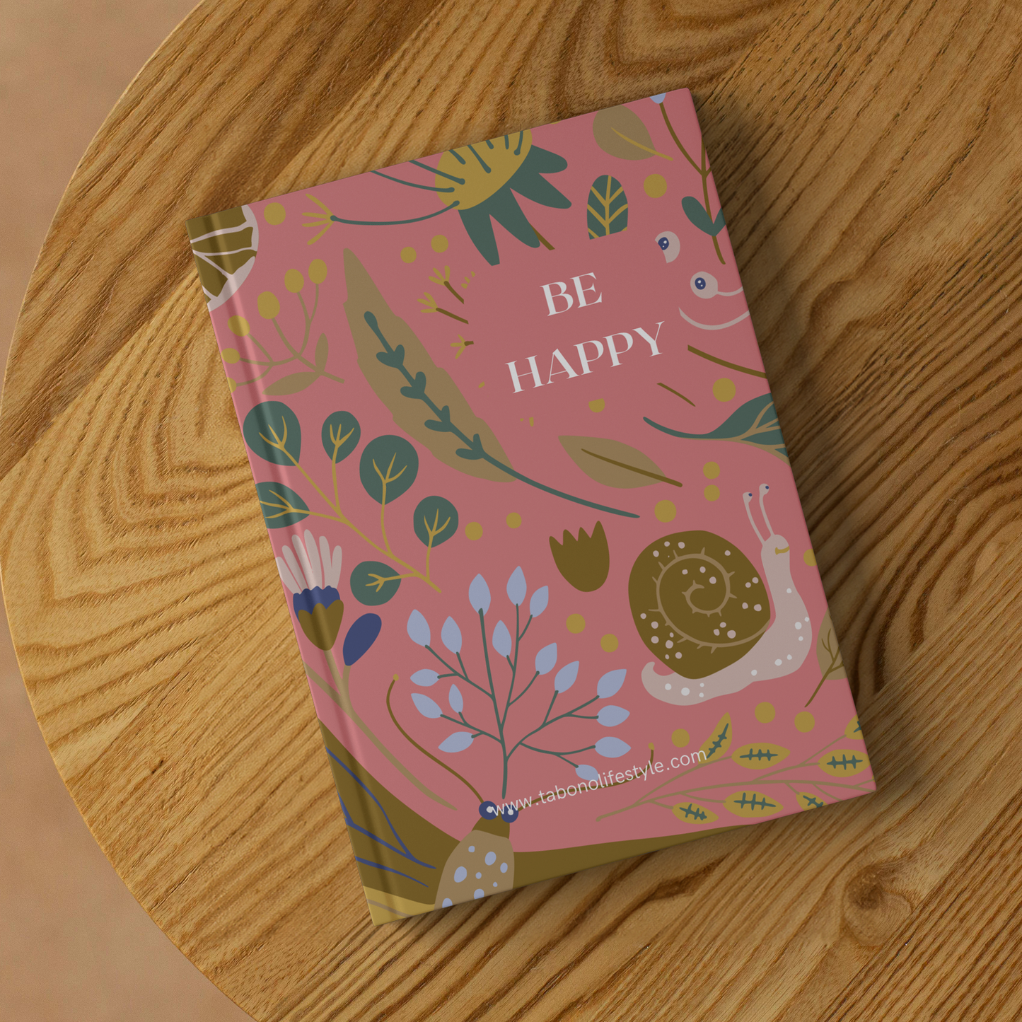 Hardcover_Journal_-_Be_Happy_-_Pink_Lifestyle_2_Mockup.png