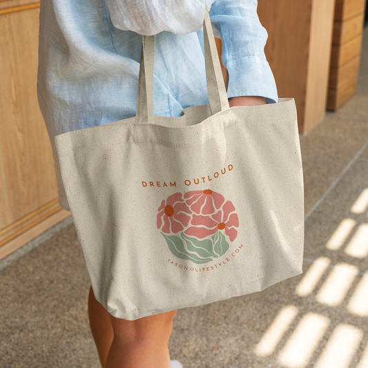 Tote_Bag_-_Dream_Out_Loud_CottonTote_L_WomanDigging_Mockup.png